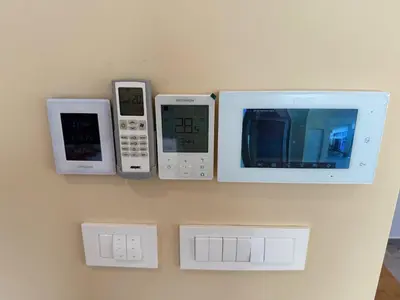 a microwave and other appliances hanging on a wall at Crown Residence Luxury 2BR in Ljubljana Downtown in Ljubljana