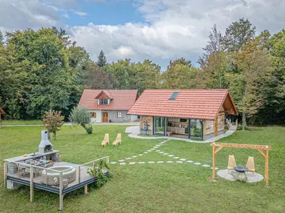 an aerial view of a house with a playground at Holiday home in Trebelno - Dolenjska & Bela krajina (Unter- & Weißkrain) 54728 in Trebelno