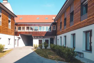an external view of a building with a courtyard at Maribella Apartment II in Maribor