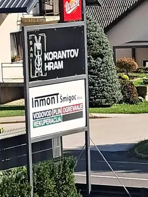 a sign in front of a store at Korantov Hram