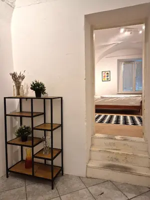 a room with a view of a bedroom at Walter Apartment City Center in Ljubljana