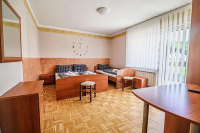 a living room with a couch and a table at Guesthouse Siva Čaplja in Videm pri Ptuju