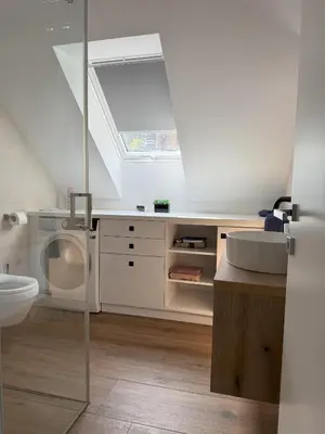 a bathroom with a toilet and a sink at Charming house in Gozd Martuljek in Gozd Martuljek