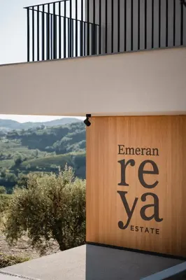 a sign on the side of a building at Emeran Reya Estate in Šmartno