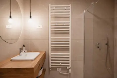a bathroom with a sink and a shower at Emeran Reya Estate in Šmartno