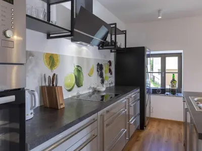 a kitchen with a sink and a counter top at Mountain View Villa with Sauna and Hot-Tub - Three Bedroom Villa with Sauna and Hot-Tub in Slovenj Gradec