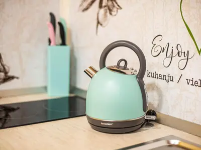 a tea kettle sitting on top of a counter at Elegant and Stylish Retreat Apartments with Terrace - Studio Apartment with Terrace in Brežice