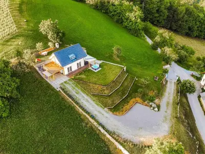 an overhead view of a house with a blue roof at Secluded Escape Hilltop Villa with Hot-Tub - Two Bedroom Villa with Hot-Tub
