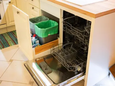 an open dishwasher with dishes in it in a kitchen at Secluded Escape Hilltop Villa with Hot-Tub - Two Bedroom Villa with Hot-Tub