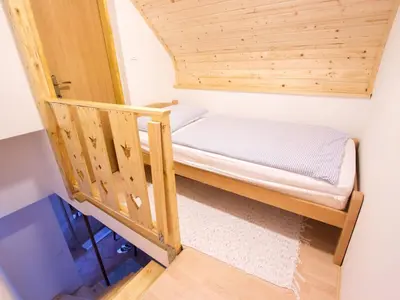 a small room with a bunk bed in it at Sunny Two Bedroom Retreat in Beautiful Bizeljsko - Two Bedroom Country House in Bizeljsko