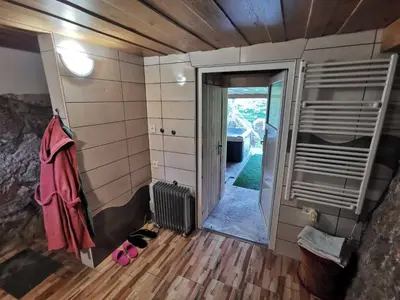 a small room with a heater in a room at Visnja Gora Meadow Hideaway with Terrace - One Bedroom Cottage with Terrace in Višnja Gora