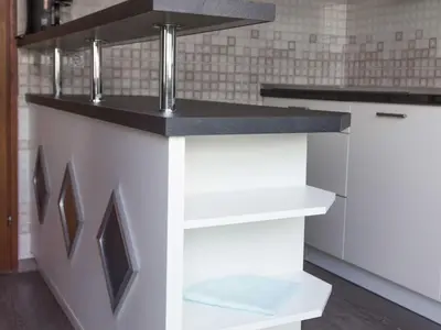 a kitchen with a counter with a sink at Two Bedroom Apartment in Rečica ob Savinji