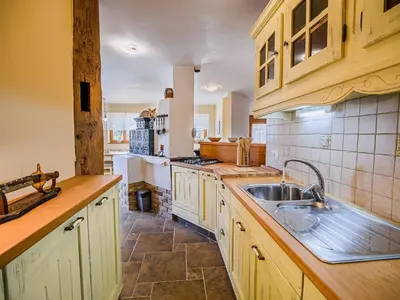 a kitchen with a sink and a counter top at Hidden Authentic Haven Apartments - One Bedroom Apartment with Terrace in Sevnica
