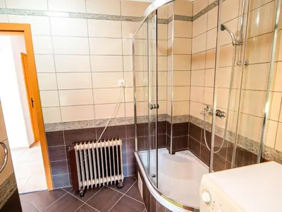 a bathroom with a shower and a bath tub at Bloomfield Retreat Country House with Sauna - Three Bedroom Country House in Rečica ob Savinji
