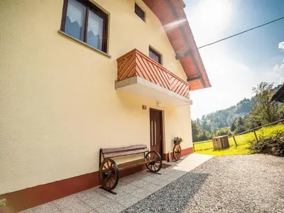 a building with a bench on the side of it at Bloomfield Retreat Country House with Sauna - Three Bedroom Country House in Rečica ob Savinji