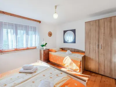 a bedroom under construction with a bed and a cabinet at Nature Hideaway Holiday Homes with Sauna - Two Bedroom Holiday Home in Slappe dʼIdria