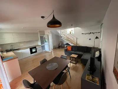 a living room with a couch and a table at Spacious 2 bed Villa near Spa Town Rogaska Slatina in Rogaška Slatina