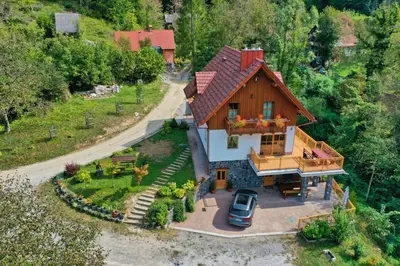 an overhead view of a house with a car parked outside at Rupicapra Holiday Mountain House in Kostel