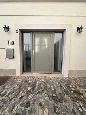 a door on the side of a building at City Center Deluxe in Kranj