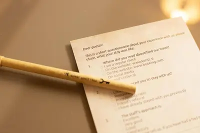 a wooden cigarette sitting on top of a piece of paper at Hotel Kunst in Krško