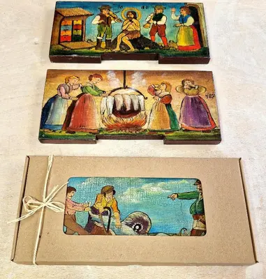 three pictures of a painting in a box at Atelje Mlin Umetnin Retreat in Šentjur