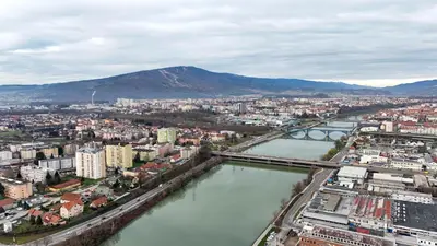 an aerial view of a city with a river at Apartma Karakter in Maribor