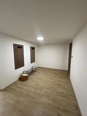 an empty room with white walls and a basket at Prista Ranch Cirkulane in Rove