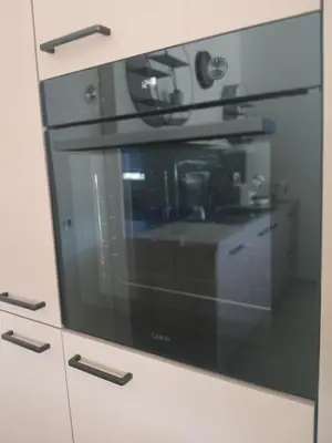 a microwave oven sitting on top of a cabinet at Apartments Ana in Maribor
