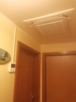 a room with a ceiling with a air conditioner at Apartment Jakovc in Bohinj