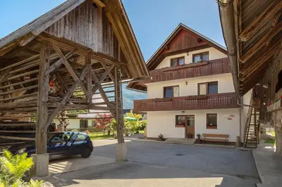 a view of a building with wooden roofs at Apartment Jakovc in Bohinj