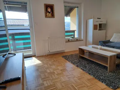a living room with a couch and a coffee table at Apartma Gašper in Šentjur
