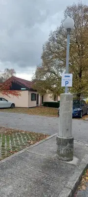 a street light on the side of a street at Studio apartma Rimljanka in Ptuj