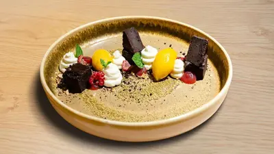 a bowl of chocolate desserts on a table at Oaza Luxury Glamping Resort in Moravske Toplice