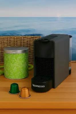 a microwave and a computer on a table at Dimora Apartments with free parking in Ljubljana