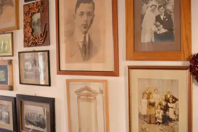 a wall with pictures of people on it at Apartma Raft, Bovec in Bovec