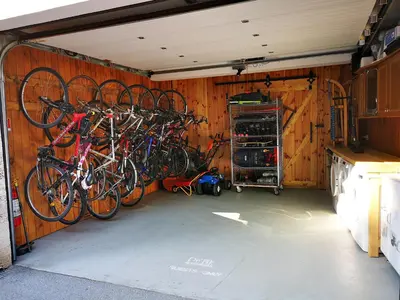 a garage with a bunch of bikes parked in it at PR`FIK Apartments in Kranj