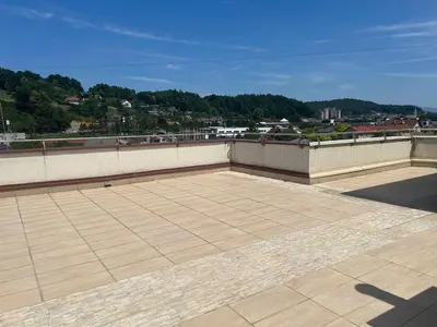 a large patio on top of a building at Stunning Terrace in Ljubljana