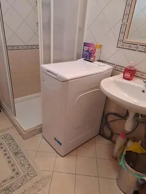 a bathroom with a shower and a toilet and a sink at Mia's room in Zreče