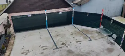 an image of a tennis court with a fence at Flegarrooms in Cerklje na Gorenjskem