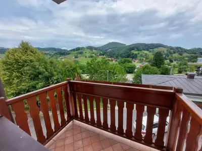 a balcony with a view of the mountains at Cozy Nook Stays, Ski rent, med Roglo in Termami Zreče, in Zreče