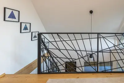a room with a glass ceiling and a staircase at Počitniška hiša Gorski Šepet Bled in Bled
