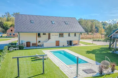 an aerial view of a house with a swimming pool at Vila Trate with Shared Pool and Garden in Ljutomer