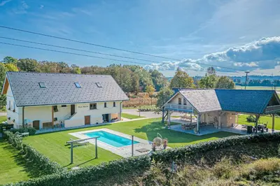 an aerial view of a house with a swimming pool at Vila Trate with Shared Pool and Garden in Ljutomer