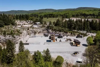 an aerial view of a resort with a snow covered yard at LYNX PRO - Basecamp units in Rove