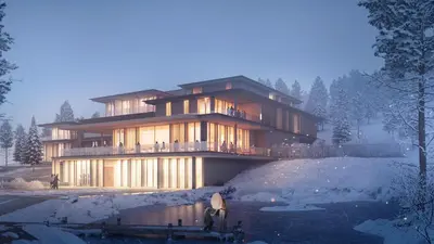a large house in the winter with snow on the ground at Butični gorski spa hotel Rimski vrelec in Kotlje