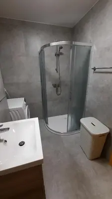 a bathroom with a shower and a sink at Holiday Apartment Bolfenk in Pohorje