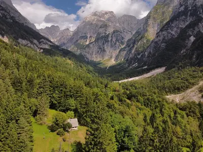 an aerial view of a valley in the mountains at Hiška Polhec in Bovec
