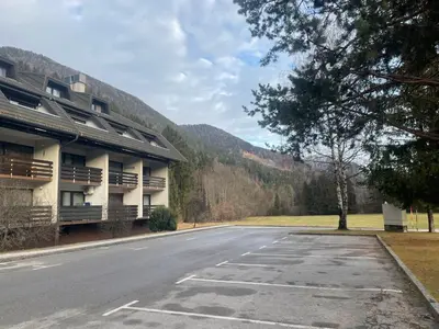 an empty street in front of a building at Sunflower in Kranjska Gora