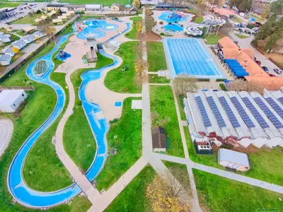 an aerial view of a pool at a water park at Villa Petz in Brežice