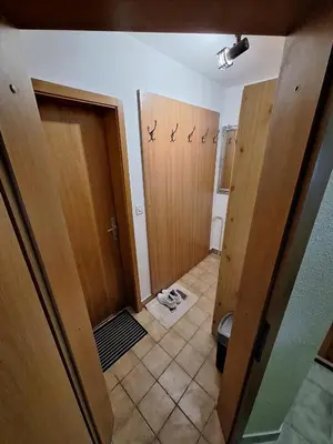 a room with a door and a tile floor at Apartma Ajdovka Rogla in Rakovec